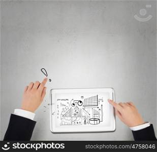 Online business concept. Top view of female hands working with white tablet