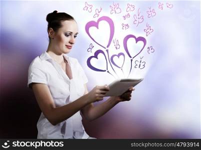 Online dating. Young attractive woman using tablet pc to chat