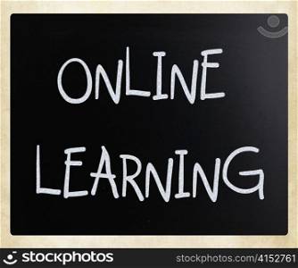 ""Online Learning" handwritten with white chalk on a blackboard"