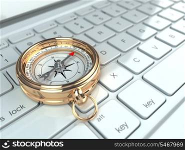 Online navigation. Compass on laptop keyboard. 3d