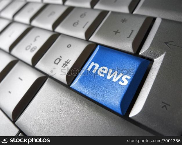 Online news Internet concept with news sign and symbol on a blue laptop computer key for blog, website and online business.