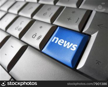 Online news Internet concept with news sign and symbol on a blue laptop computer key for blog, website and online business.