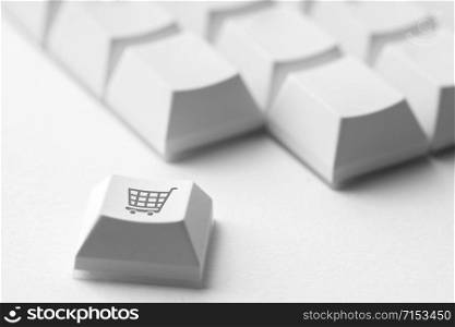 Online shopping & business icon on retro computer keyboard