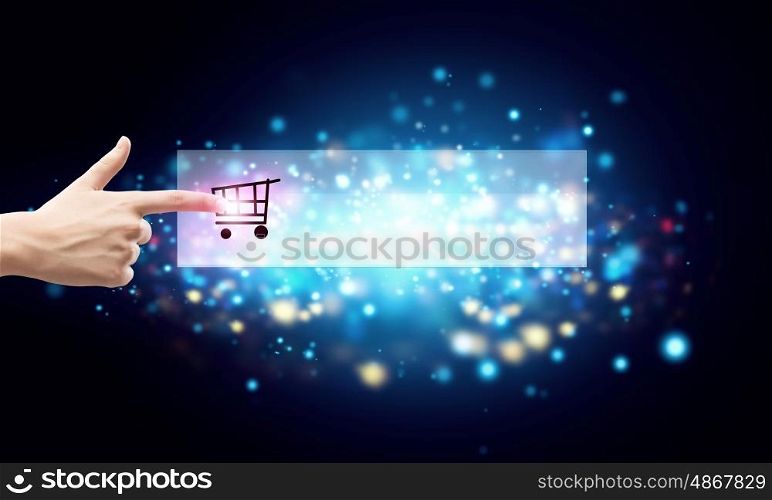 Online shopping concept with finger touching digital shopping icon. Online shopping