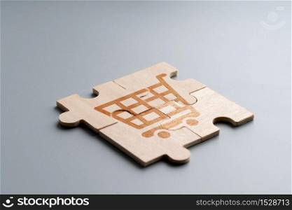 Online shopping icon on wood puzzle