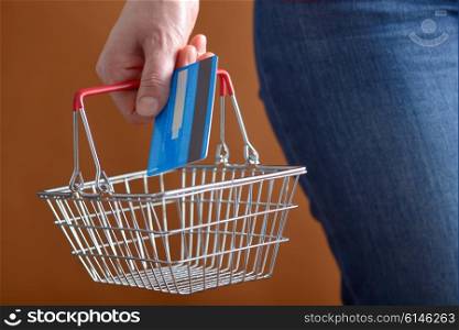 Online shopping with shopping basket and credit card