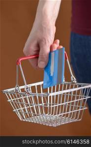 Online shopping with shopping basket and credit card
