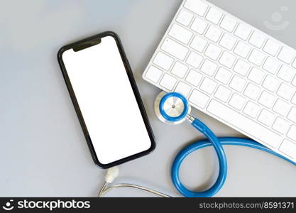 online telemedicine concept, stethoscope and pc keyboard with modern phone, medical app mock up. online medicine concept