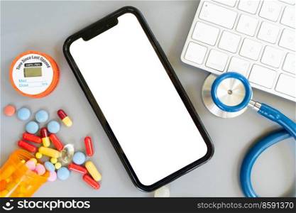 online telemedicine concept, stethoscope and pills with modern phone, medical app mock up. online medicine concept