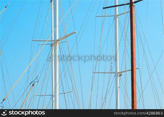 Only mast yacht and blue sky