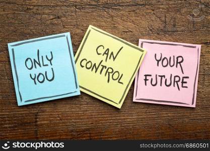Only you can control your future - positive words on sticky notes against rustic wood