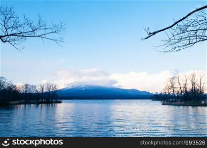 Onuma Koen Quasi -National park lake and Mount Komagatake view in peaceful cold winter. Hakodate, Hokkaido - Japan.