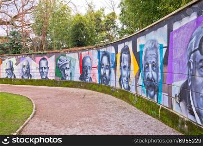 Opatija, Croatia January 4, 2017 - Opatija Wall of fame in The Angiolina Park view. Famous people murals painted by unknown authors in beautiful mediterranean park.