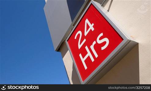 Open 24 hours retail shopping sign.