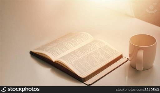Open a bible by the window with a cup of coffee for the morning light. and put it on a wooden table with a window light