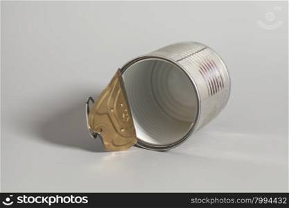 Open an empty tin can on gray background