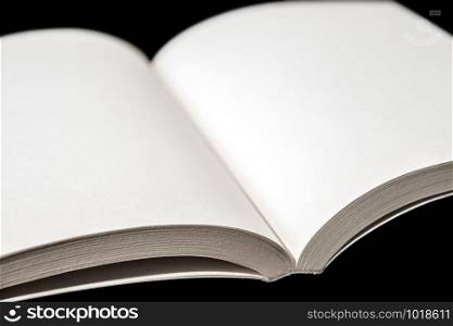 Open blank book mockup on black background. Open blank book on black background