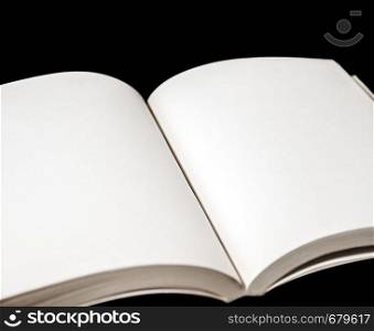Open blank book mockup on black background. Open blank book on black background