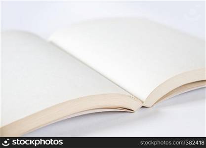 Open blank book mockup on grey background. Open blank book mockup