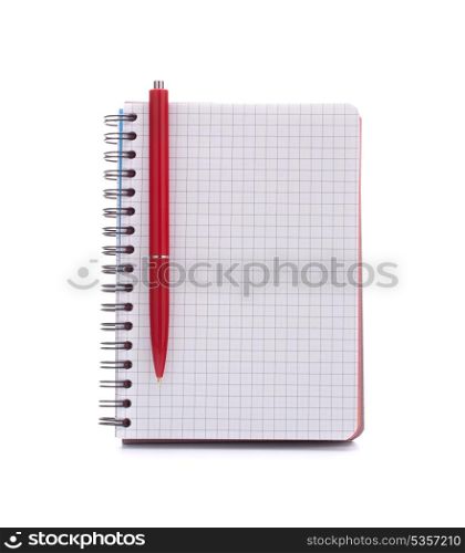 Open blank checked notebook with red pen isolated on white background cutout