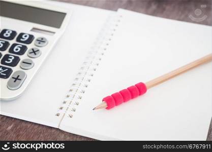 Open blank notebook with pencil, stock photo