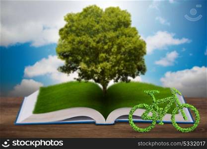 Open book and bicycle in ecological concept - 3d rendering