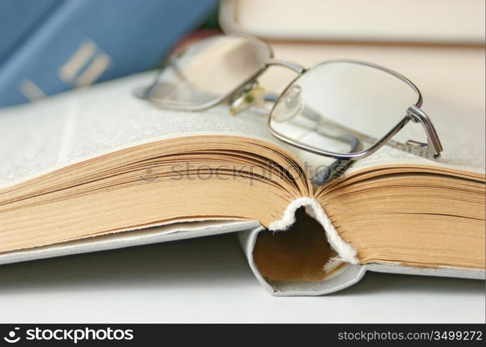 open book and glasses