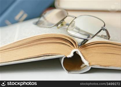 open book and glasses