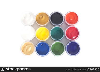 Open colorful cans of gouache paint isolated on white