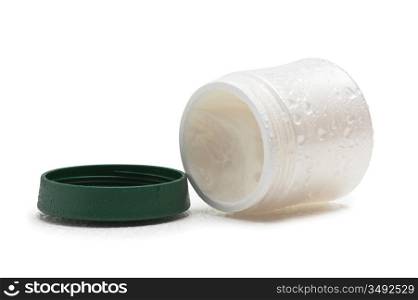 open cosmetic cream jar wet isolated on a white background
