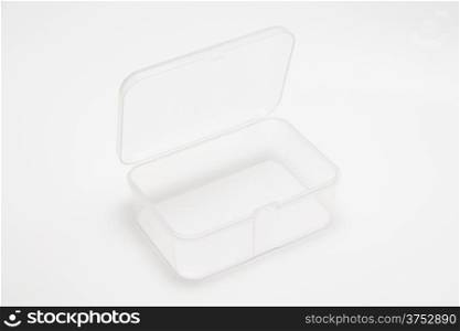 Open empty transparent plastic box on white background