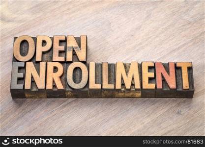 open enrollment word abstract in vintage letterpress wood type