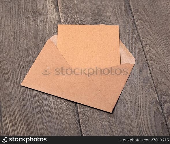 Open Envelope on a wooden background
