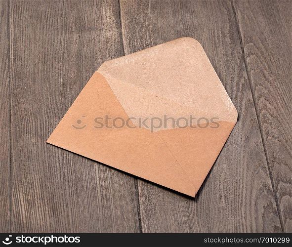Open Envelope on a wooden background