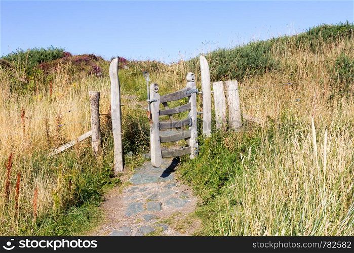 Open Gate on a pathway on Llanddwyn Island, Anglesey, Wales