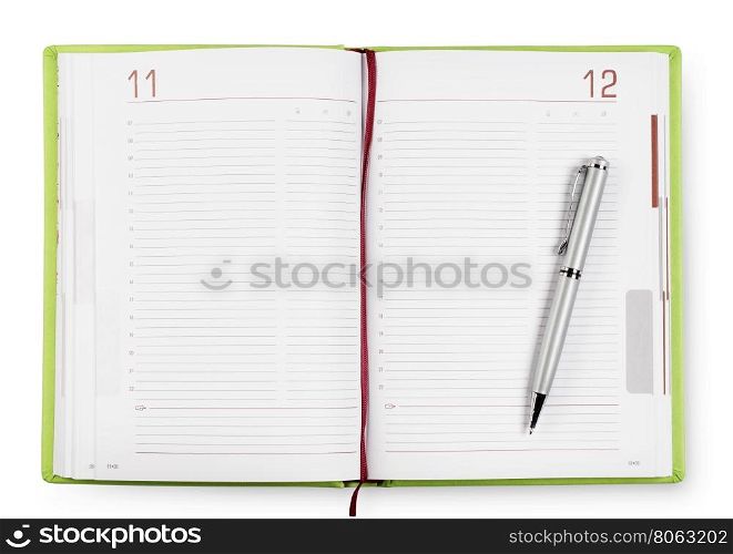 Open green diary with a pen isolated on white background. Open green diary with a pen