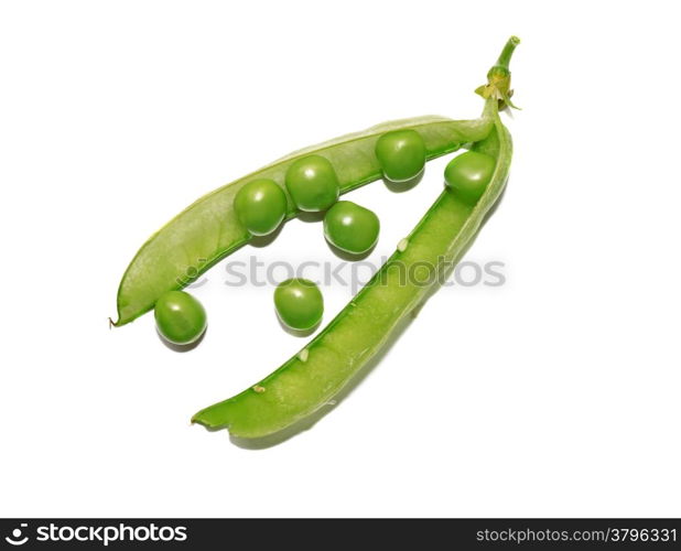 Open green pea pod with peas close-up isolated