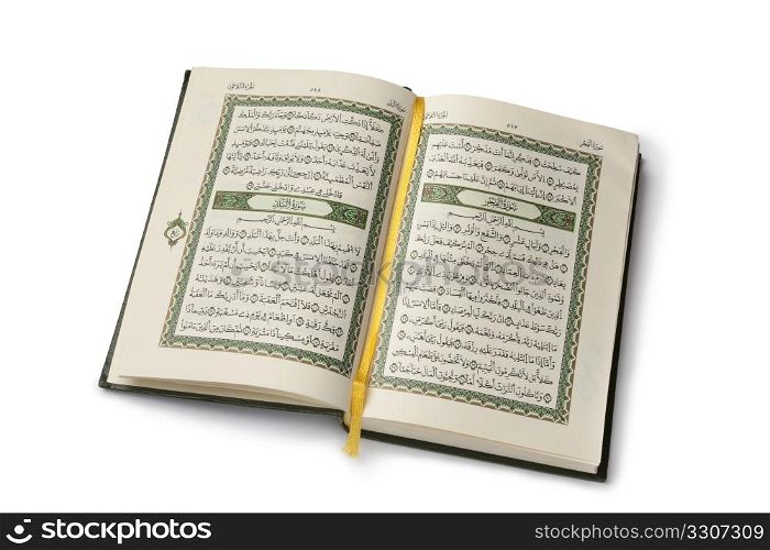Open Koran book isolated on white background