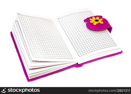 Open notebook in a purple cover on a white background