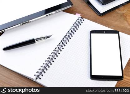 open notebook, mobile phone and black pen on white background