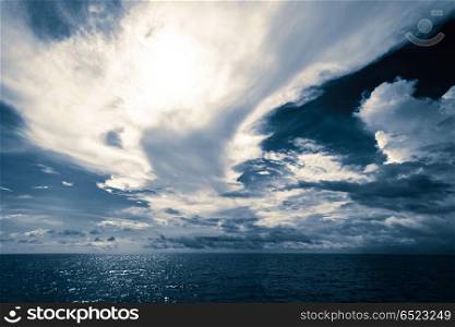Open ocean and cloudy sky. Open ocean and cloudy sky. Summer tropical travel. Open ocean and cloudy sky