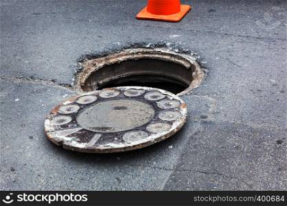 open old manhole and repair of roads