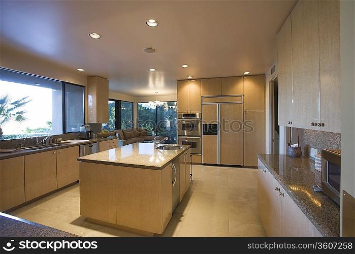 Open plan kitchen in neutral colours Palm Springs