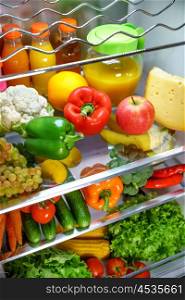 Open refrigerator filled with food. Healthy food.