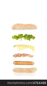 open sandwich, floating sandwich, hot dog sandwich with sausage, bacon, cheese and lettuce