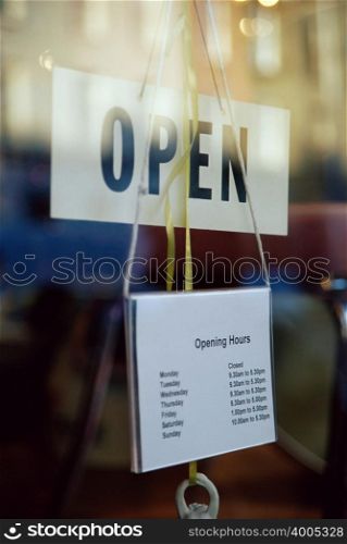 Open sign in shop window