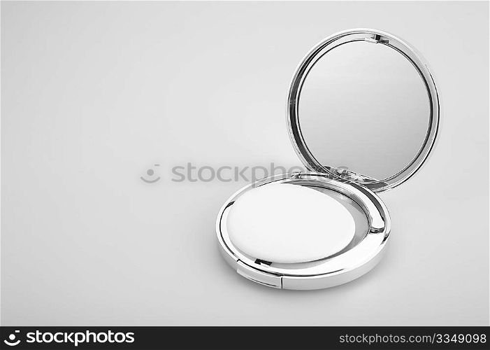 Open silvery packing of the compact powder, isolated