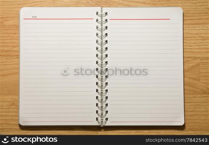 Open Spiral Notepad on the table