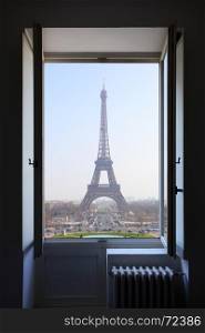 Open window and Eiffel Tower behind