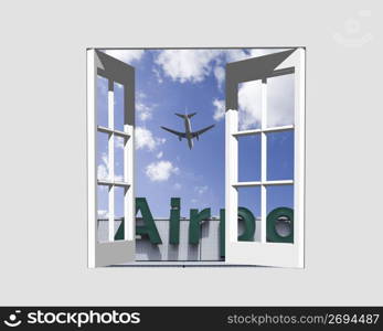 Open window looking out to an aiport sin and a flying plane